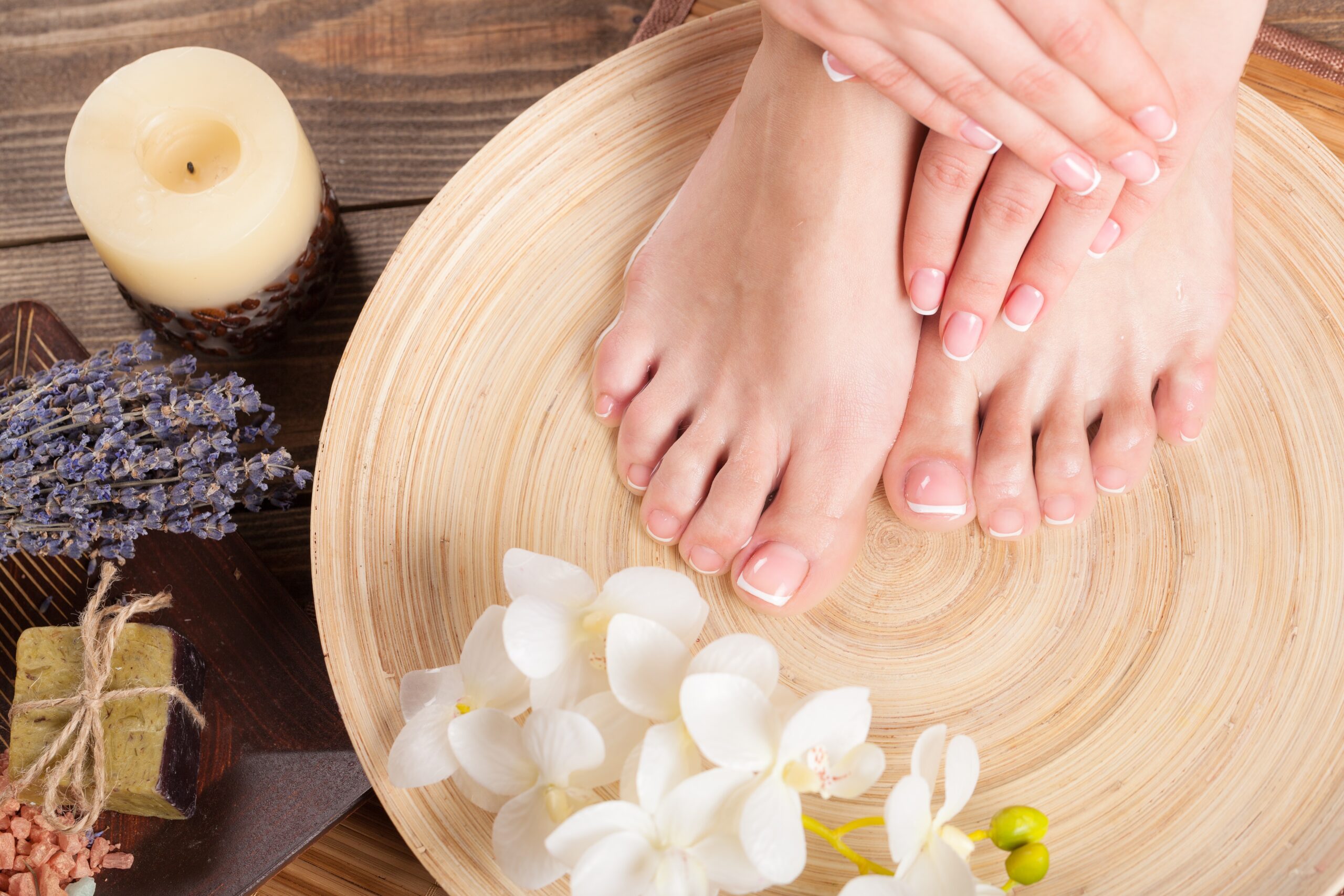 Spa and Wellness Setting with Female Feet on a Plate